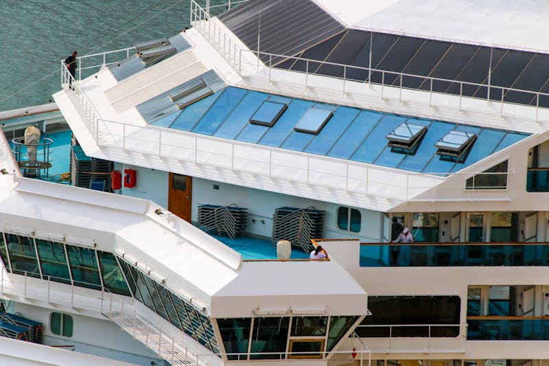 Passengers relaxing on board an Irish Ferries vessel with ocean views